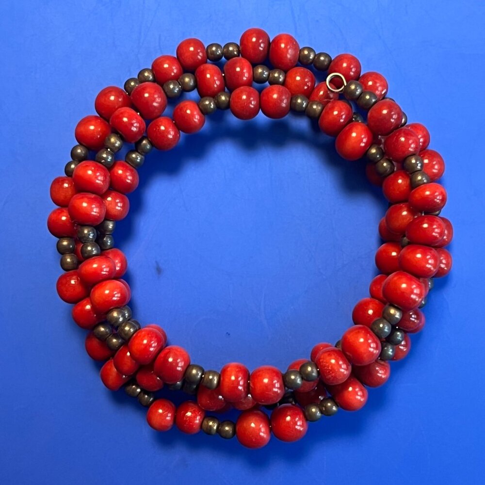 Red beaded wrap around bracelet.